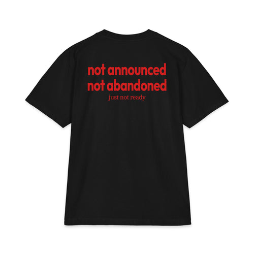 Black t-shirt with red text on the back against a white background