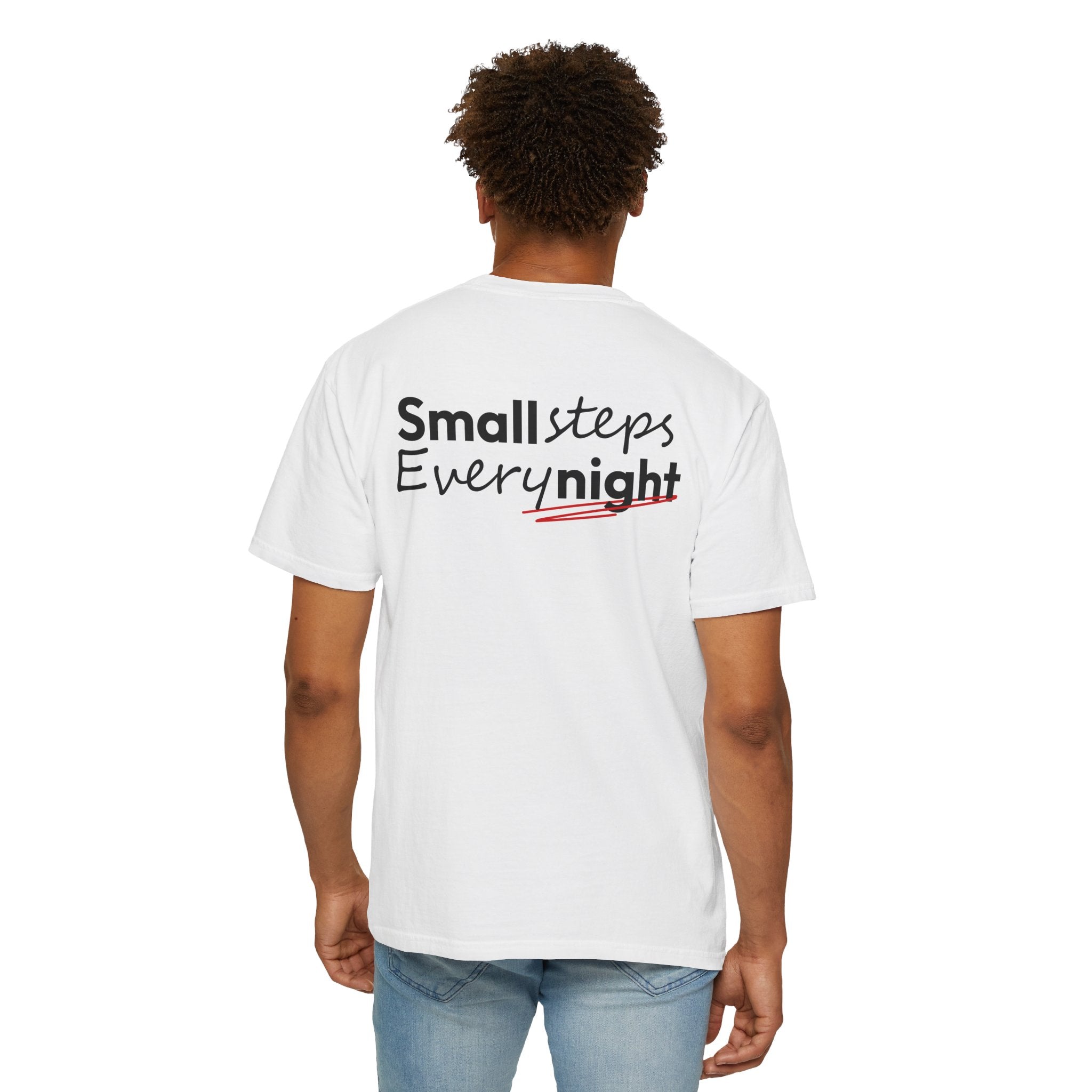 Person wearing a White t-shirt with 'Small steps Every night' text on a white background