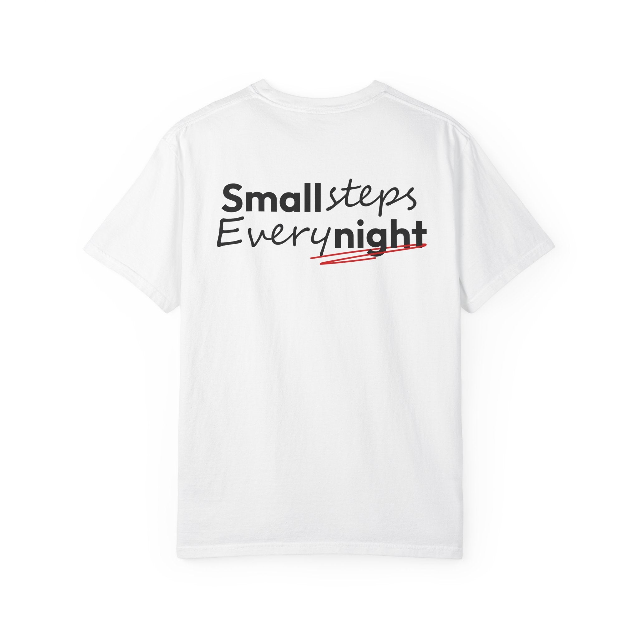 White t-shirt with 'Small steps Every night' text on a white background