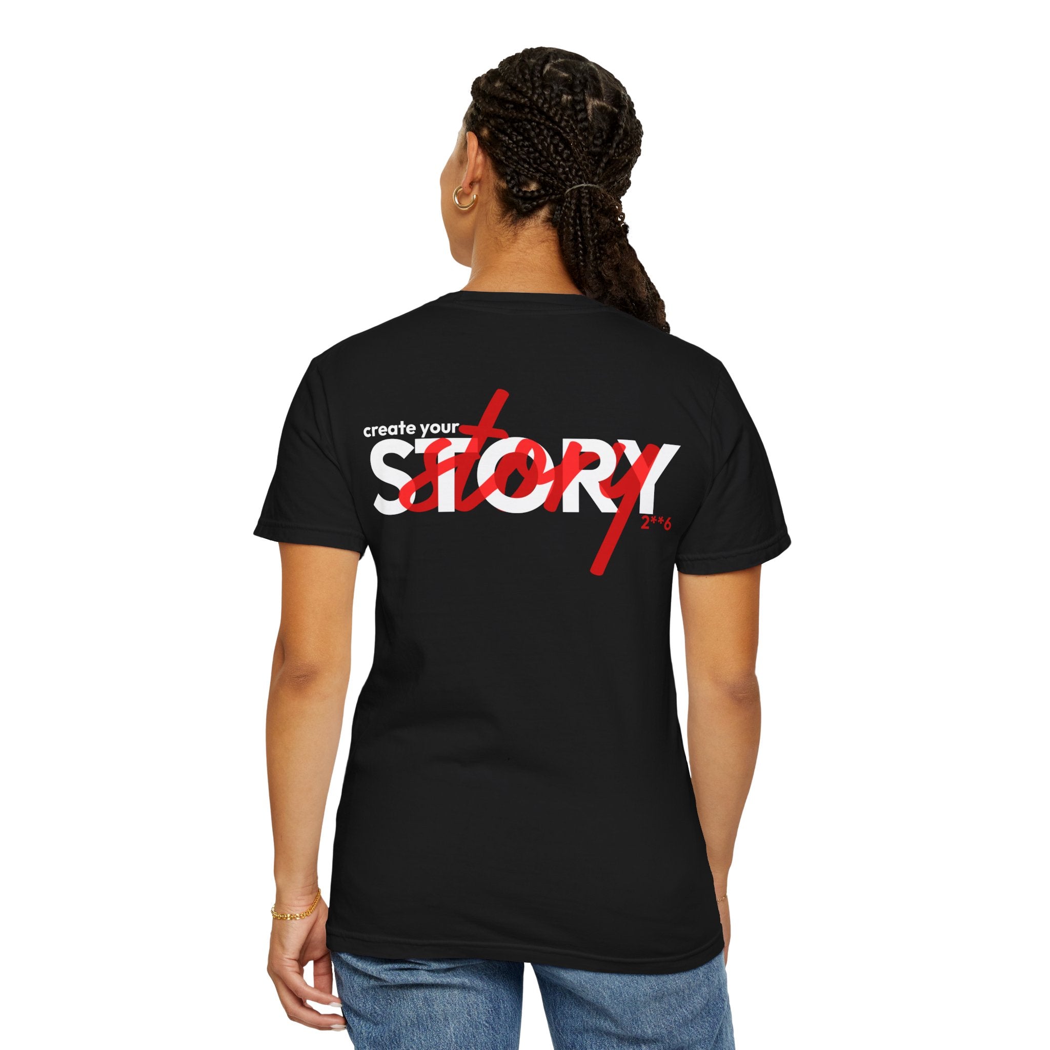 Person wearing a Black t-shirt with 'create your story' text on the back
